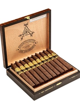 Open box of Montecristo 1935 Anniversary Nicaragua Torpedo cigars with dark, oily Habano wrappers and sleek, bold bands.