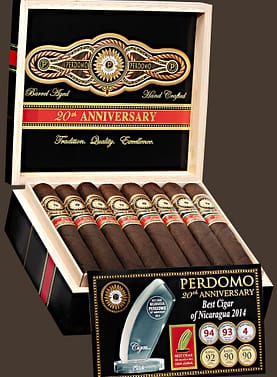 An open box of Perdomo 20th Anniversary Maduro cigars, showcasing dark, oily wrappers and elegant gold-and-blue bands, neatly arranged inside a premium wooden box.
