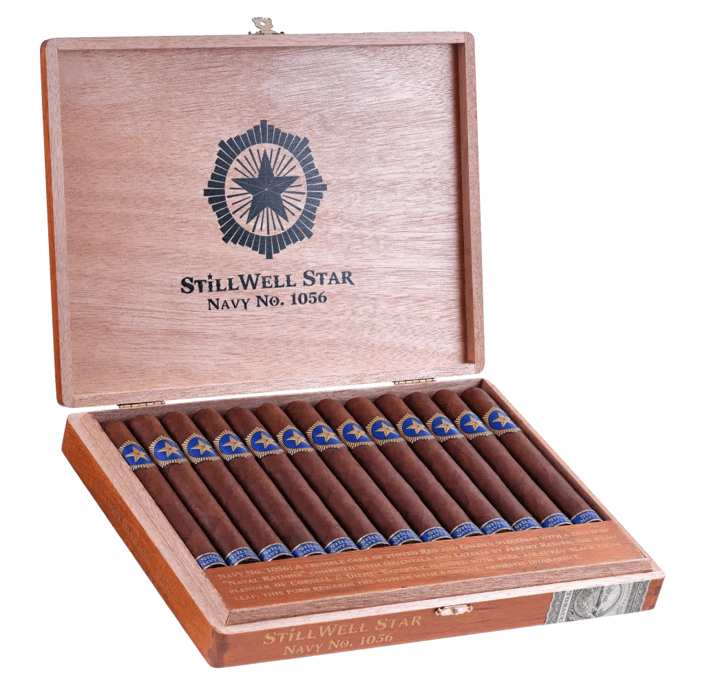 Open box of StillWell Star cigars with elegant bands and dark, smooth wrappers