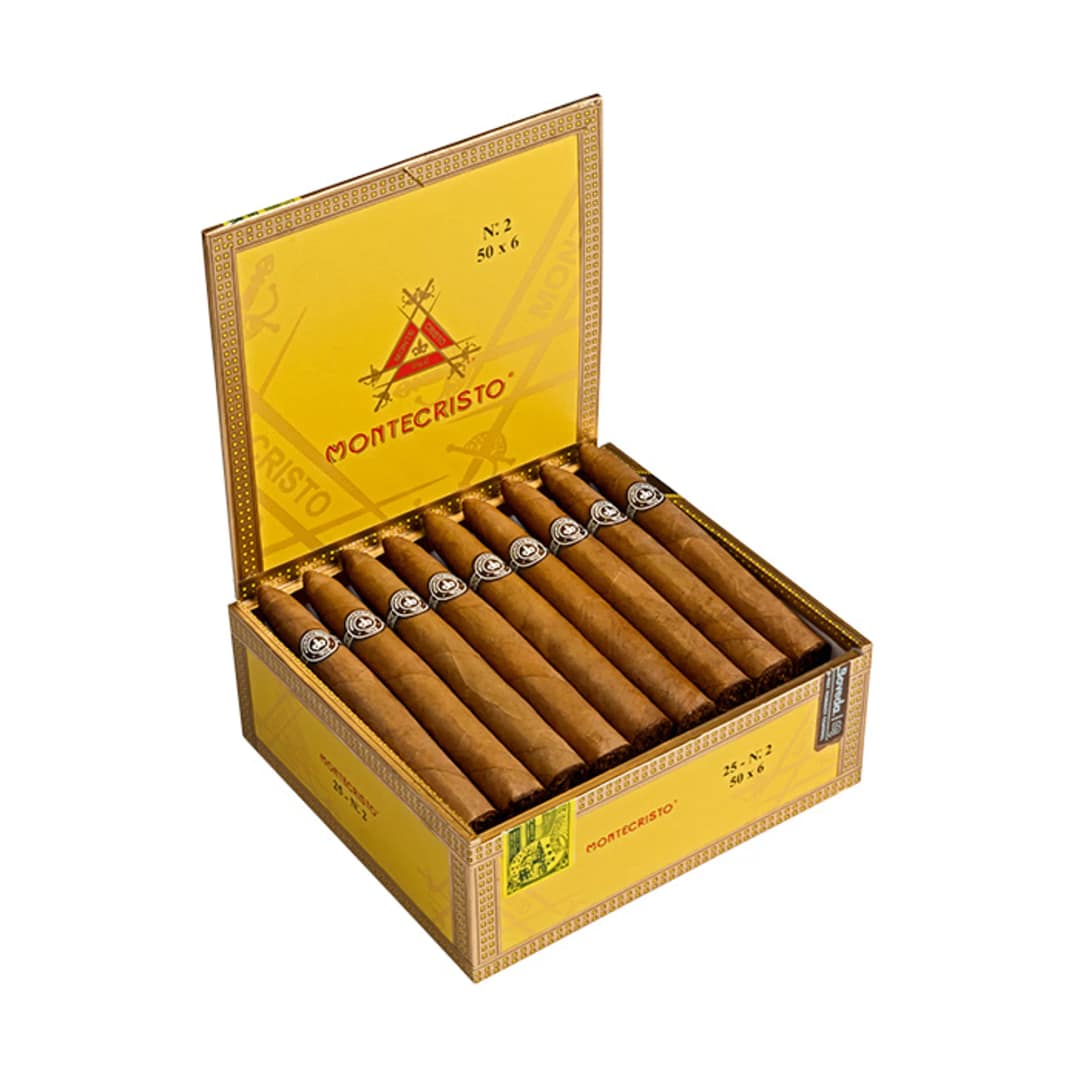 Open box of Montecristo Original cigars with golden Connecticut Shade wrappers and classic white and gold bands.