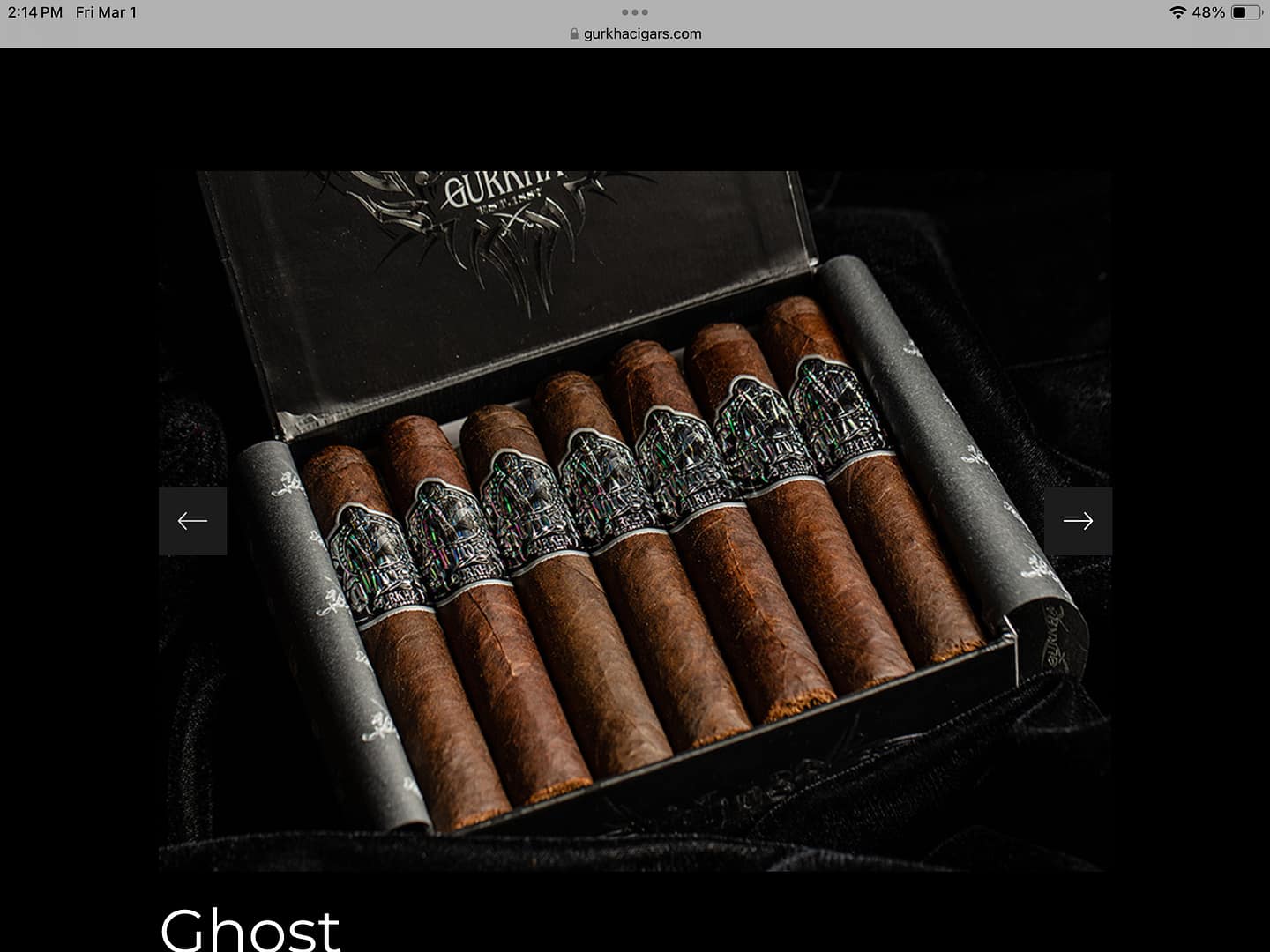 Open box of Gurkha Ghost cigars with dark wrappers