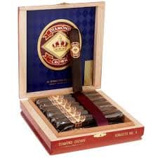 Open box of Diamond Crown Maduro cigars with dark, rich Connecticut Broadleaf wrappers and elegant gold-and-red branding.