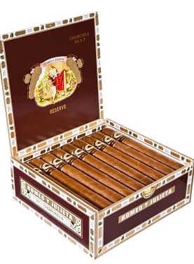 Open box of Romeo y Julieta Reserve cigars with dark Ecuadorian Sumatra wrappers and premium red and gold bands.