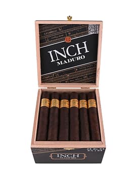 Open box of Inch Maduro cigars with dark, rich wrappers and a bold, premium presentation.