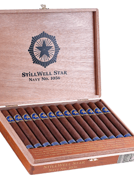 Open box of StillWell Star cigars with elegant bands and dark, smooth wrappers