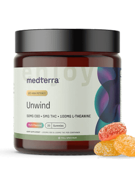 Jar of Medterra Unwind CBD Gummies with a few gummies beside it, highlighting texture and serving size.