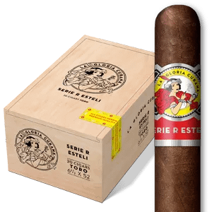 La Gloria Cubana Serie R Estelí cigar displayed in front of its closed box, showcasing the bold red and gold branding.