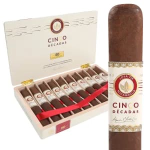 Open box of Joya de Nicaragua Cinco Decadas cigars, showcasing the luxurious dark wrappers and premium craftsmanship