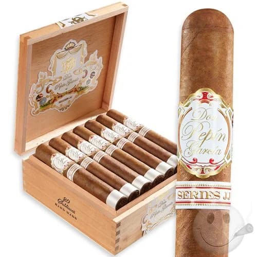 Single Don Pepin Garcia Series JJ cigar with open box behind it
