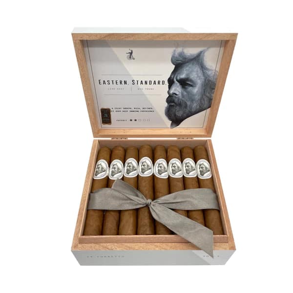 Open box of Eastern Standard cigars featuring silky, light-brown wrappers and sophisticated Caldwell branding