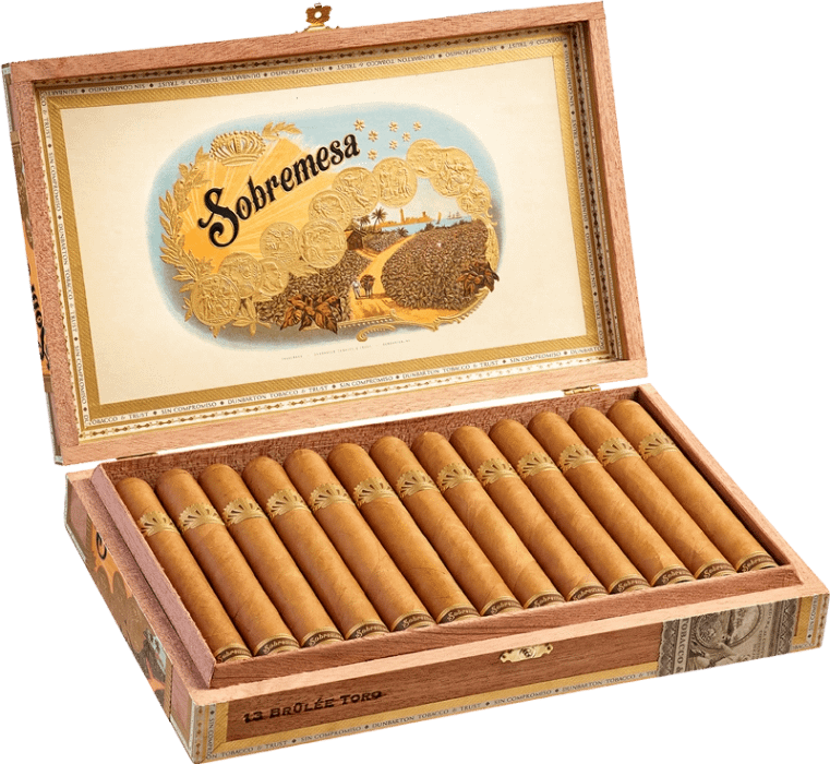 Open box of Sobremesa Brûlée cigars with light Connecticut wrappers and gold-trimmed bands