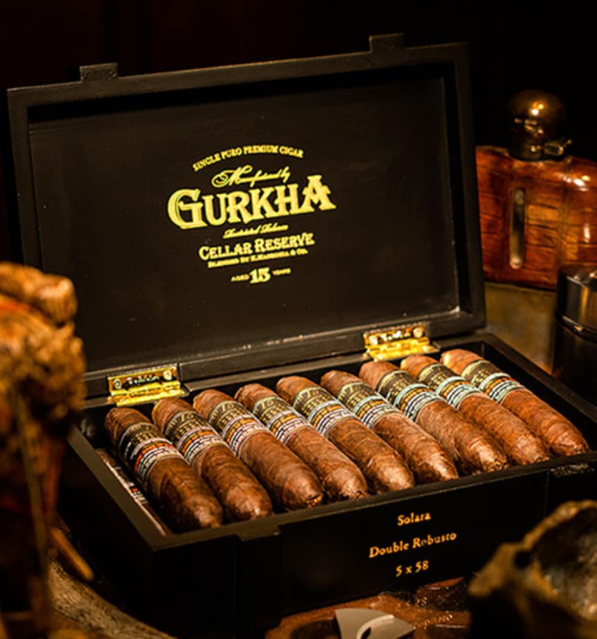 Open box of Gurkha Cellar Reserve Limitada Maduro cigars with dark wrappers