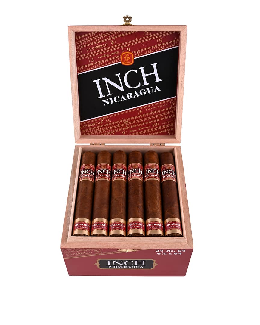 Open box of Inch Nicaragua cigars with dark Nicaraguan wrappers and bold black-and-gold bands neatly arranged in a wooden box.