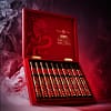 Open box of Rocky Patel Year of the Dragon cigars with elegantly arranged cigars and vibrant packaging.