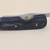 Rami's cigar knife with sleek black wood handle and stainless steel blade