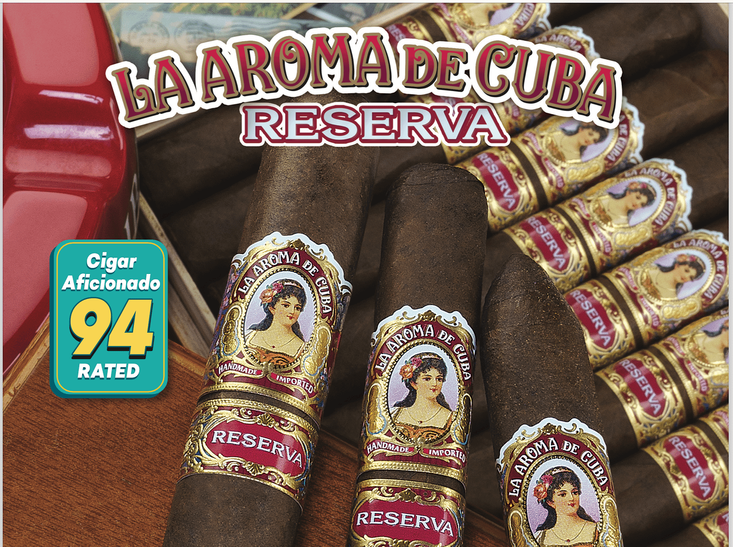 Box of La Aroma de Cuba Reserva cigars with dark, oily wrappers and vintage-style bands neatly arranged in cedar box.