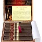 Open box of Padrón Family Reserve Maduro cigars with dark wrappers and individually numbered bands