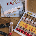 Open box of 20 Acre Farm cigars neatly arranged, showing smooth Connecticut wrappers
