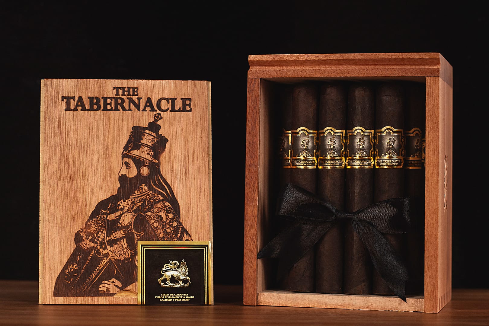 The Tabernacle Maduro cigar featuring a dark, oily Connecticut Broadleaf wrapper and a richly detailed band.