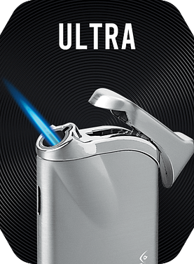 Silver Vector Ultra Lighter with a lit single torch flame.