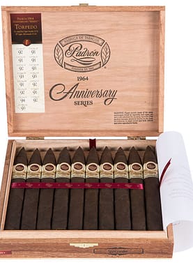 Open box of Padrón 1964 Anniversary Series Maduro cigars with dark, rich wrappers and classic Padrón bands