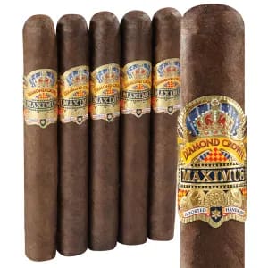 Open box of Diamond Crown Maximus cigars with five dark, oily cigars arranged in the front, showcasing bold bands and luxurious presentation.