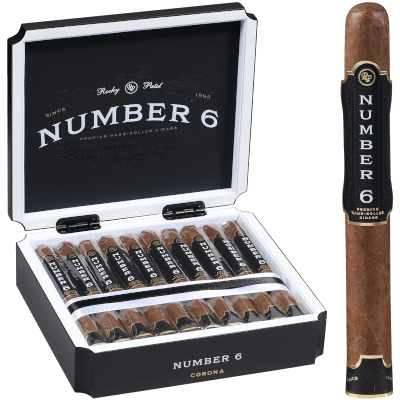 Open box of Rocky Patel Number 6 cigars with smooth, golden-brown wrappers and bright red bands.