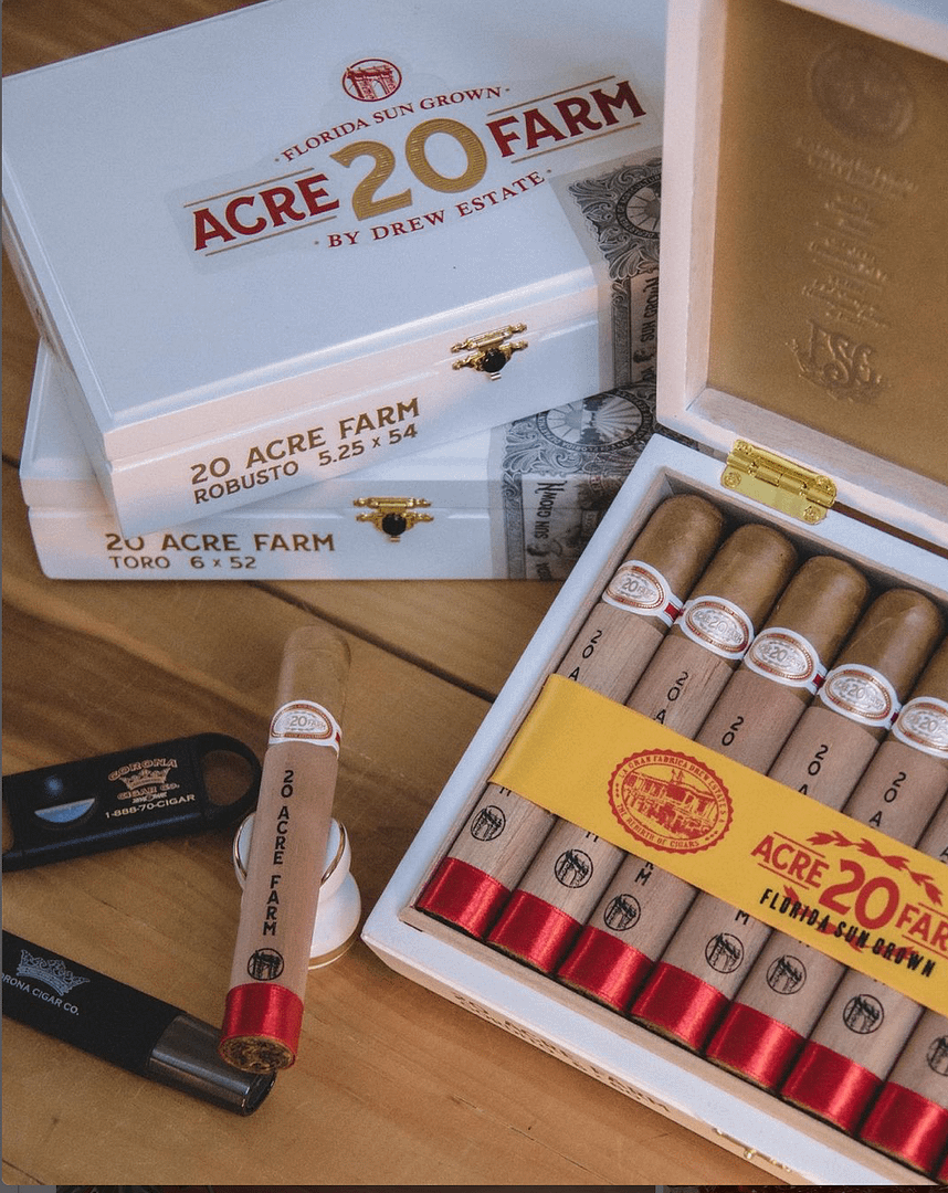 Open box of 20 Acre Farm cigars neatly arranged, showing smooth Connecticut wrappers