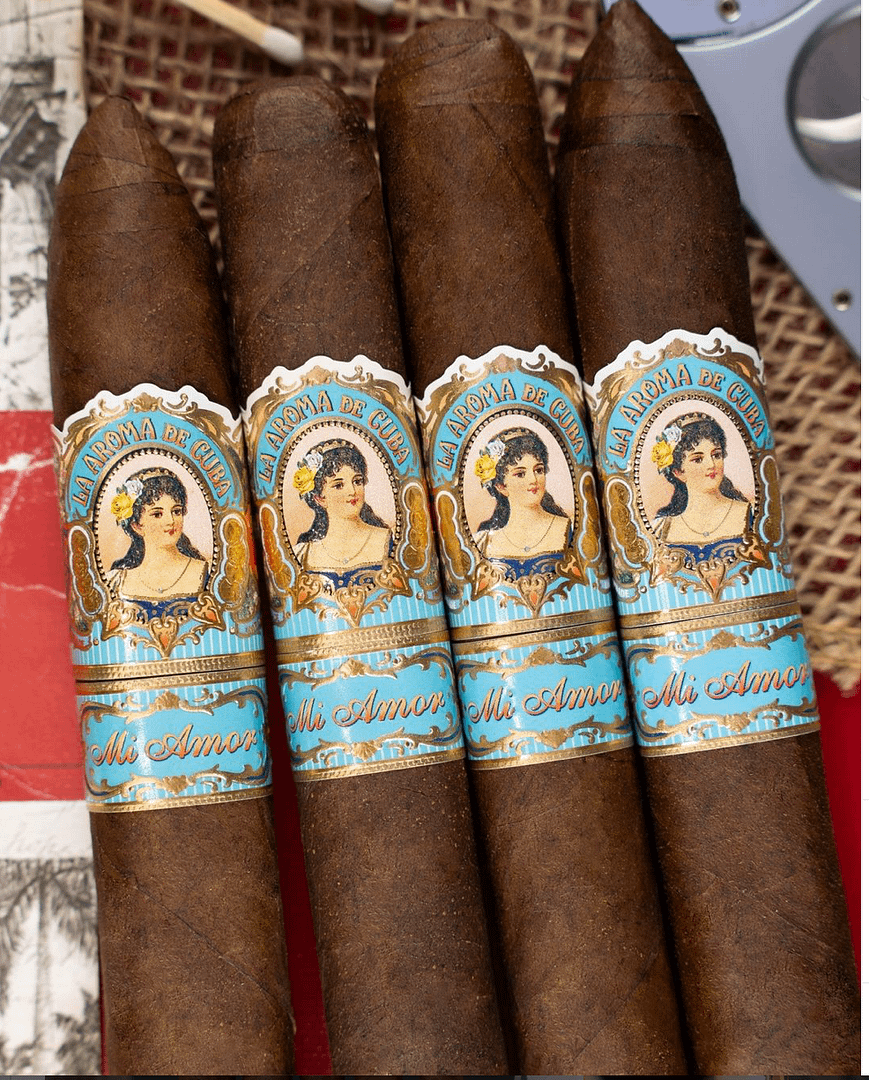 La Aroma de Cuba Mi Amor cigar with rich, dark San Andrés wrapper and ornate band featuring vintage artwork.