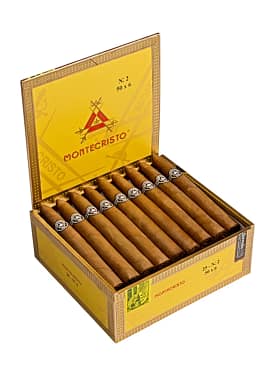 Open box of Montecristo Original cigars with golden Connecticut Shade wrappers and classic white and gold bands.