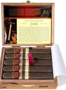 Open box of Padrón Family Reserve Maduro cigars with dark wrappers and individually numbered bands