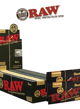 Open display of RAW Black Single Wide rolling papers showcasing their thin, natural hemp texture