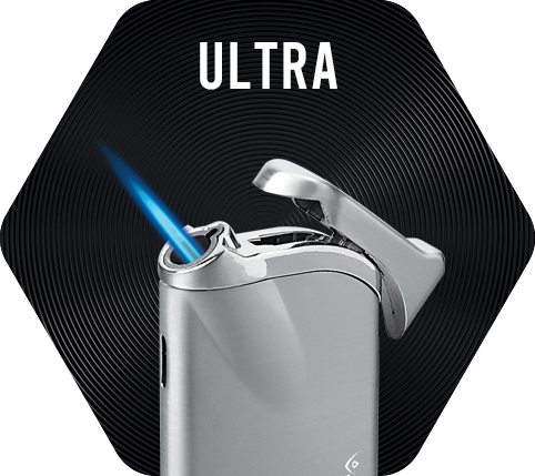 Silver Vector Ultra Lighter with a lit single torch flame.