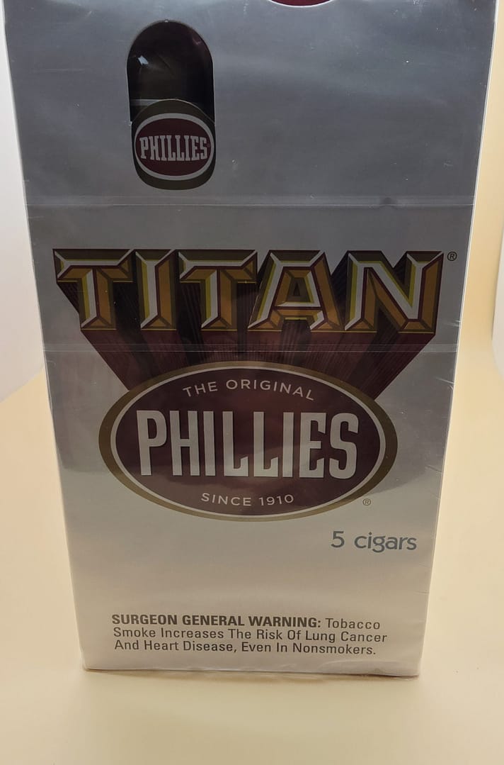 Phillies Titan Pack of 5 cigars in a sealed pouch, showcasing rich brown cigars with classic banding.