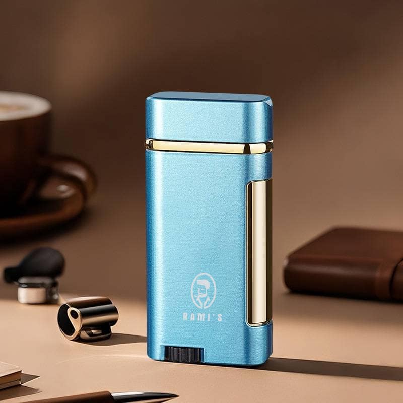 Blue Rami’s dual flame rechargeable lighter with premium metal finish and compact windproof design displayed on desk.