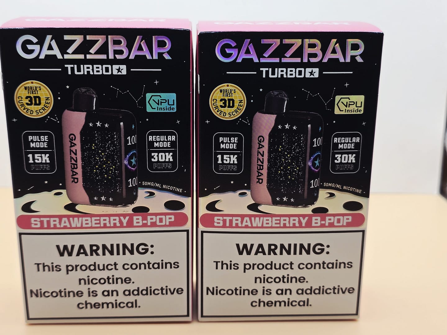 2 Pack Gazzbar Disposable Vape Strawberry B-Pop flavor with 30,000 puffs, dual mesh coil, 28ml e-liquid, and quick charge 800mAh battery.