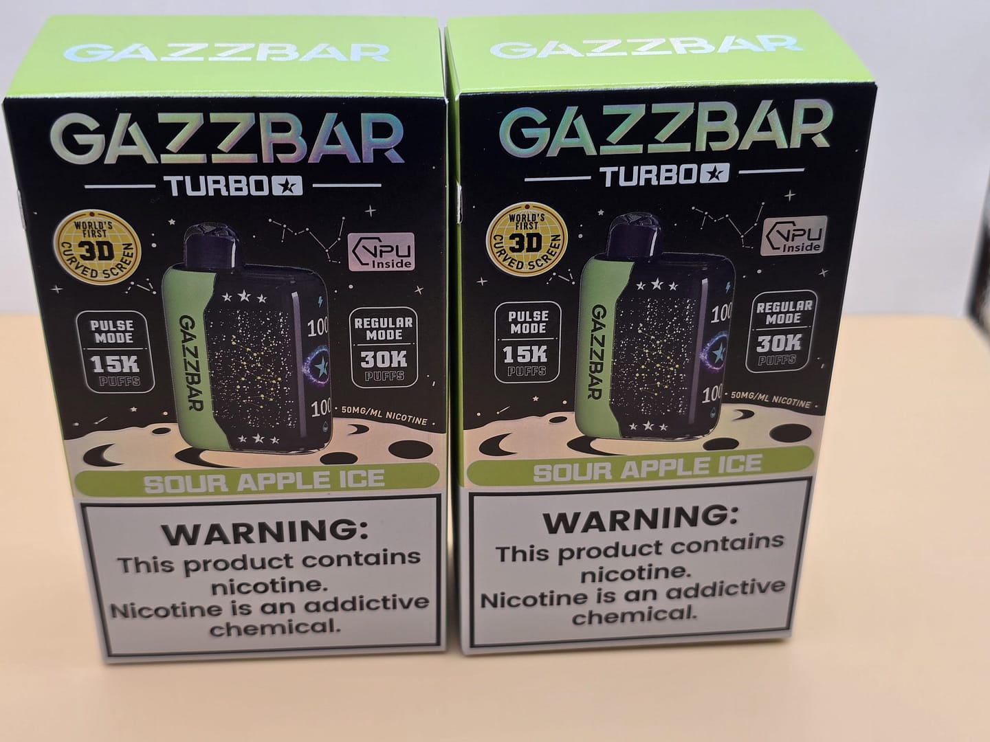 2 Pack Gazzbar Disposable Vape Sour Apple Ice flavor with 30,000 puffs, dual mesh coil, quick charge battery, and 3D curved screen.