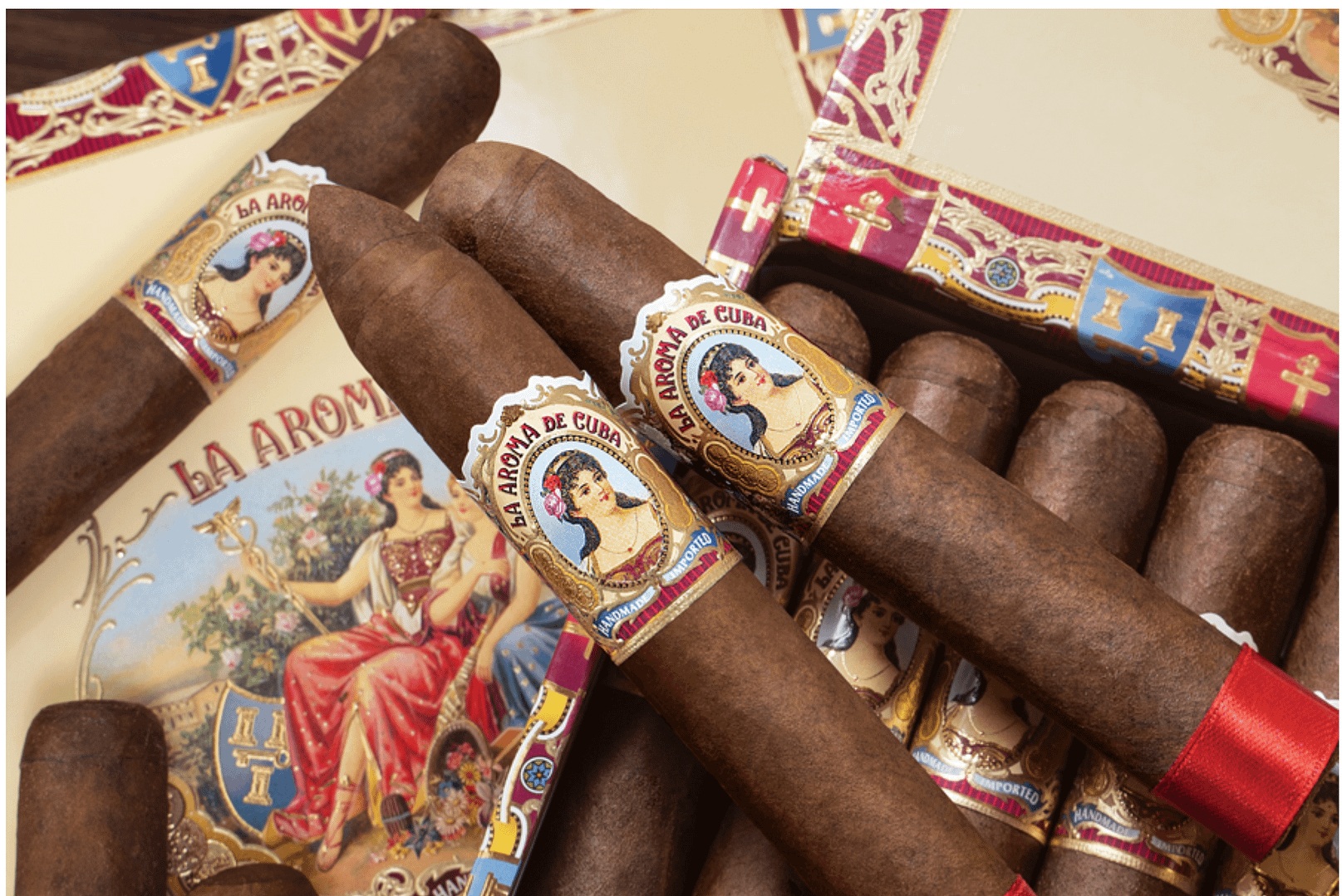 Box of La Aroma de Cuba Original cigars arranged neatly with vintage-style bands and rich brown wrappers.
