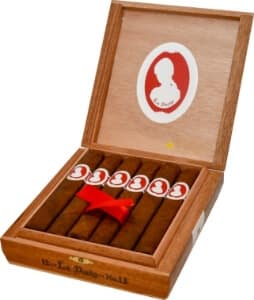La Duena cigars by My Father displayed in an open box with red and white banding.