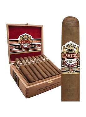 Box of Ashton Heritage Puro Sol cigars with sun-grown Dominican wrappers and elegant bands, arranged neatly in a cedar box.
