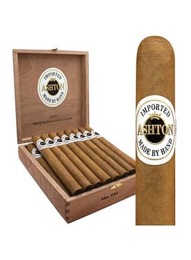 "An open box of Ashton Classic cigars showcasing neatly arranged, light golden cigars with white and gold bands, set in a cedar-lined wooden box."