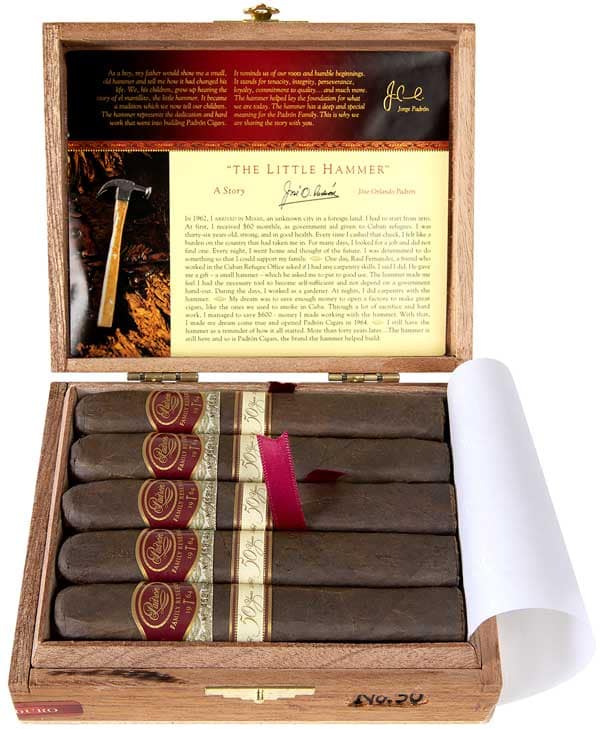 Open box of Padrón Family Reserve Maduro cigars with dark wrappers and individually numbered bands