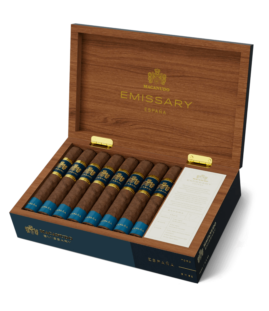 Open box of Macanudo España Emissary cigars with elegant Spanish-themed packaging and premium presentation.