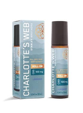 Charlotte’s Web CBD Roll-On bottle with herbal ingredients in background, highlighting its natural, soothing formula.