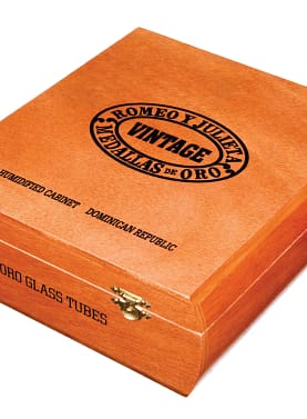 Closed box of Romeo y Julieta Vintage cigars with elegant white and gold design and classic branding.