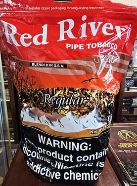 Red River Red 16 oz bag of pipe tobacco featuring bold lettering and resealable packaging.